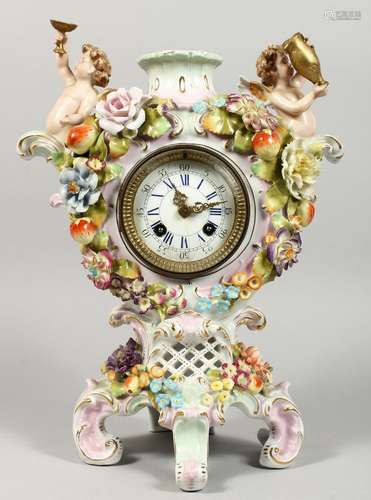 A 19TH CENTURY DRESDEN PORCELAIN CLOCK with cupids encrusted...