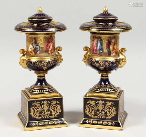 A SUPERB PAIR OF VIENNA BLUE GROUND URNS ON STANDS WITH COVE...