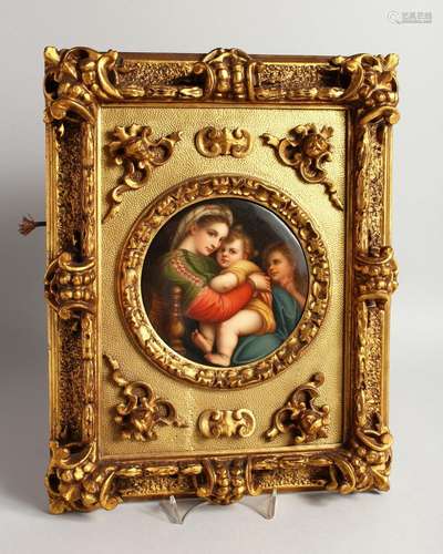 A GOOD GERMAN PORCELAIN CIRCULAR PLAQUE, Madonna and child 5...