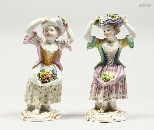 TWO SMALL MEISSEN PORCELAIN FIGURES OF YOUNG GIRLS holding a...