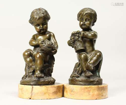 A GOOD PAIR OF EARLY 19TH CENTURY BRONZES OF SEATED PUTTI on...