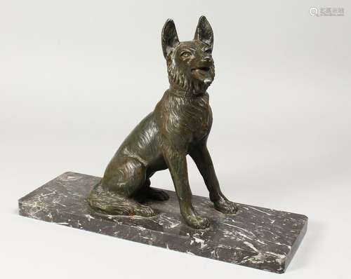 AN ART DECO CAST SPELTER MODEL OF A SEATED ALSATIAN, on a re...