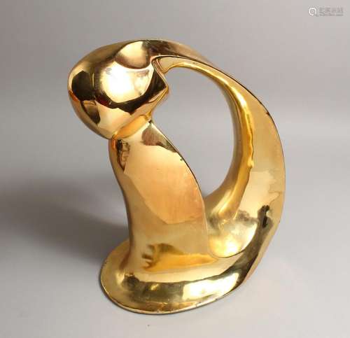 A LARGE GILDED BRONZE ABSTRACT FIGURE. 16ins high.