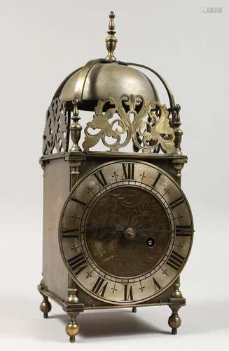 AN 18TH CENTURY BRASS LANTERN CLOCK of typical form, with be...