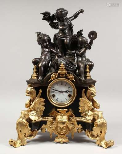 A VERY GOOD FRENCH BRONZE AND ORMOLU CLOCK, with three bronz...