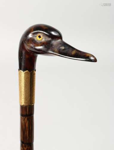 A VICTORIAN CARVED DUCK'S HEAD WALKING STICK, maker J. ...