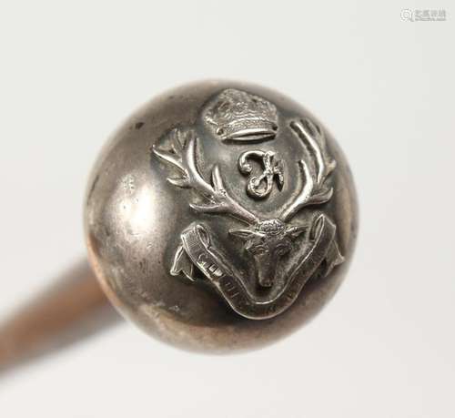 A SILVER TOP CANE with military crest. 29ns long.