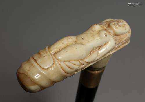 A WALKING STICK with bone handle, NUDE. 33ins long.