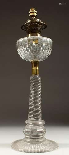 A GOOD VICTORIAN GLASS OIL LAMP on a circular base. 23ins hi...