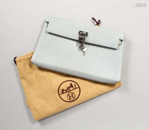 A HERMES PALE BLUE HANDBAG with lock and key in a dust bag a...