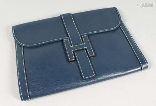 A BLUE LEATHER CLUTCH BAG. 11ins x 7.5ins.