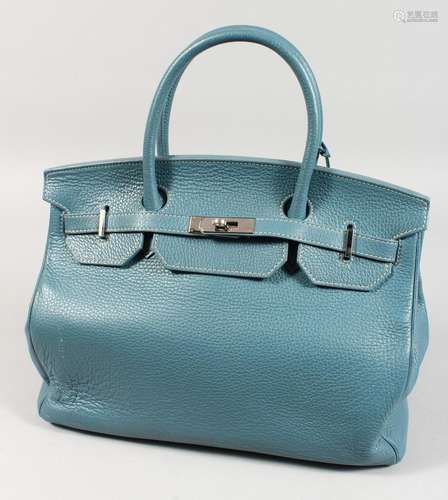 A BLUE LEATHER HANDBAG. 14ins x 11ins.