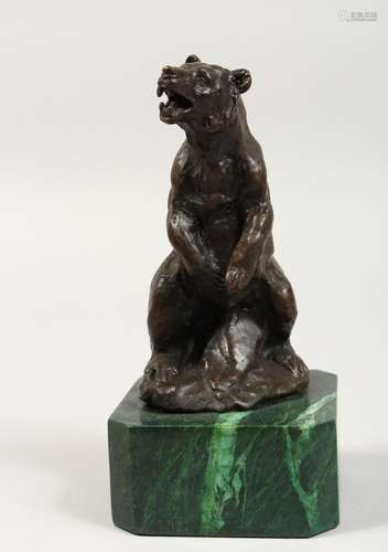 L. CARVIN A BRONZE BEAR on a marble stand. 5.5ins high.