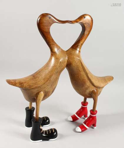 A PAIR OF WOOD LOVERS DUCKS. 19ins high.