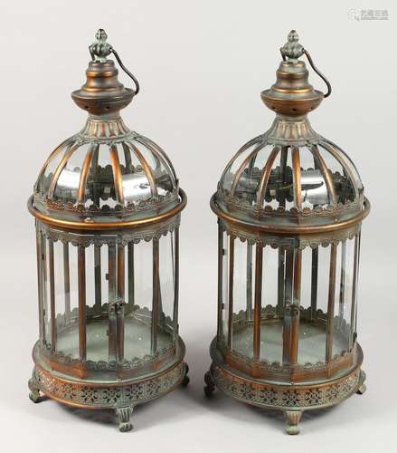 A PAIR OF METAL CIRCULAR HANGING LAMPS. 24ins.