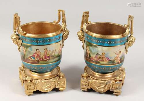 A PAIR OF PORCELAIN AND ORMOLU TWO-HANDLED JARDINIERES with ...