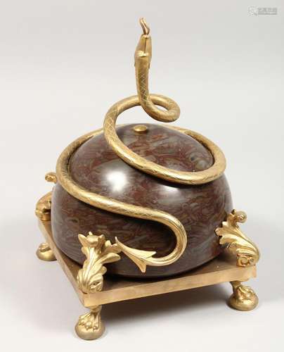 A GILT BRONZE AND MARBLE CENTREPIECE with a curling snake, o...