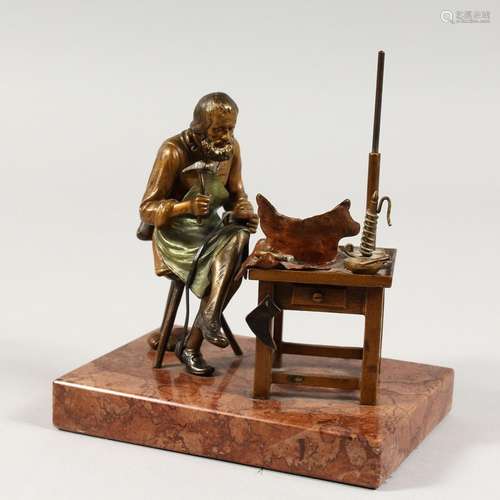 A VIENNA BRONZE COBBLER on a marble base. 5.25ins.