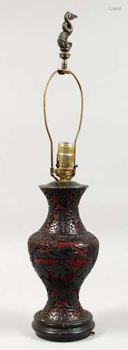 A CHINESE CINNABAR LAMP. 12ins high.