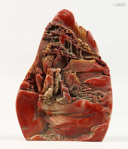 A CHINESE CARVED HARDSTONE BOULDER. 9ins high.