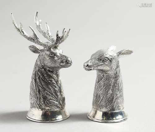 A PAIR OF .800 DEERS HEAD SALT AND PEPPERS, stag and doe.