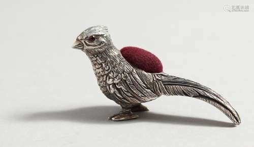 A SILVER PHEASANT PINCUSHION.