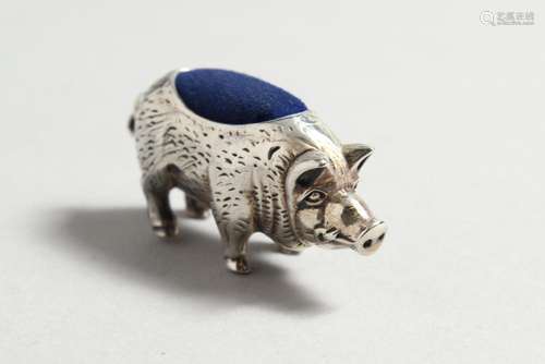 A SILVER PIG PINCUSHION.