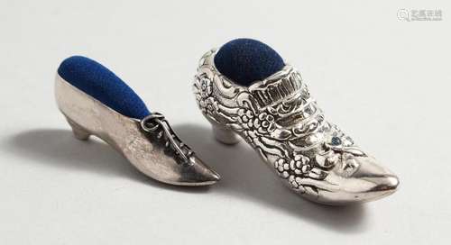 TWO SILVER SHOE PINCUSHIONS.