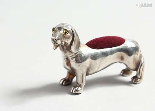 TWO SILVER DACHSHUND PINCUSHIONS.