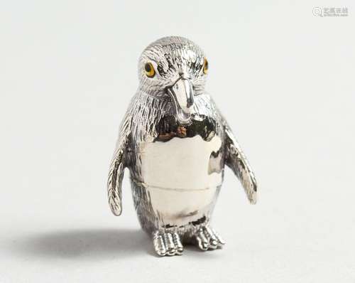 A CAST SILVER PENGUIN.