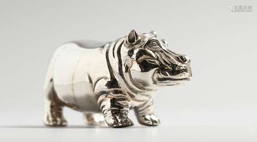 A CAST SILVER HIPPO.