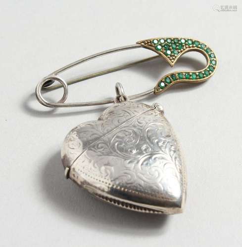 A SILVER HEART SHAPED VESTA AND PIN.