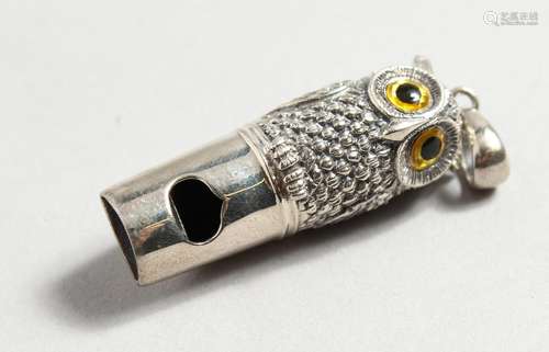 A NOVELTY SILVER OWL WHISTLE.