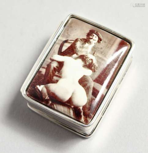 A SILVER EROTIC PILL BOX.