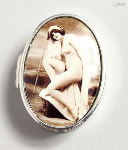 A SILVER EROTIC PILL BOX.