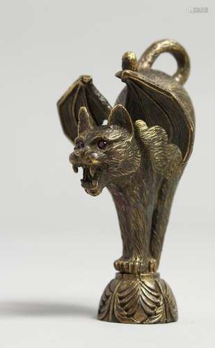 A BRASS SEAL, cat with bats wings.