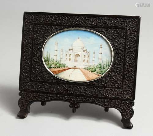 A GOOD INDIAN PAINTED IVORY OVAL PLAQUE of the Taj Mahal. 4i...