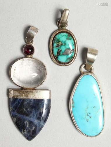 THREE SILVER AND TURQUOISE PENDANTS