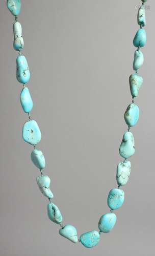 A TURQUOISE STONE NECKLACE