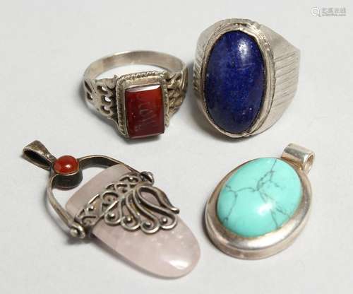 TWO SILVER RINGS AND TWO PENDANTS (4).