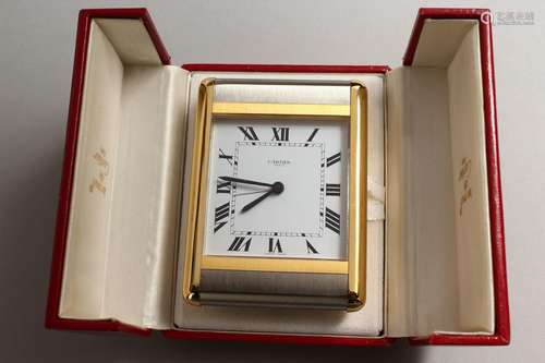 A VERY GOOD CARTIER PARIS TRAVELLING CLOCK in a red Cartier ...