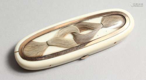 A GEORGIAN IVORY AND GOLD TOOTHPICK CASE, the top inset with...