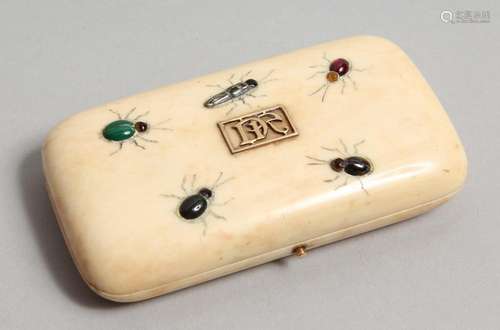 A GOOD IVORY CASED NECESSAIRE with scissors, thimble etc., w...