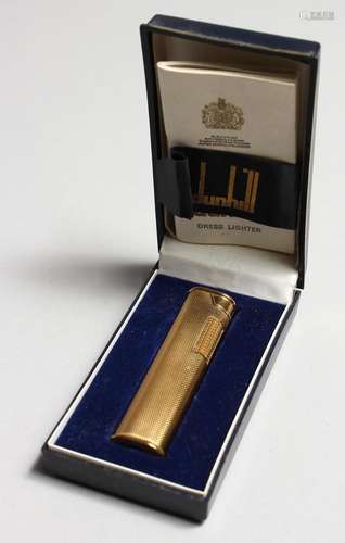 A LADIES GILT DUNHILL LIGHTER with paper in original box.