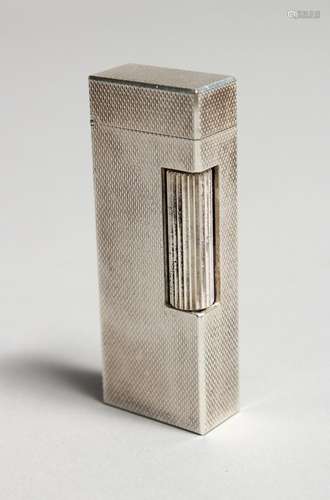 A MANS SILVER DUNHILL LIGHTER, Swiss made.