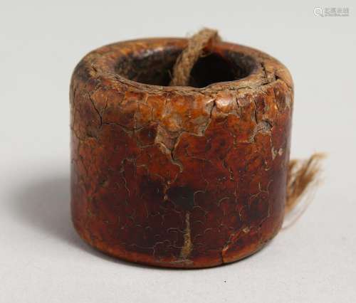 A HORN / AMBER ARCHERS RING.