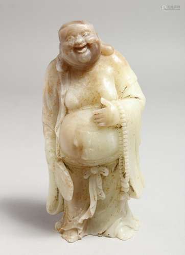 A CHINESE CARVED JADE FIGURE. 7ins high.