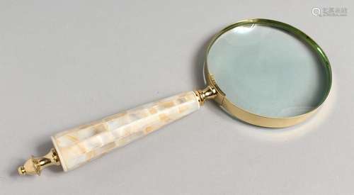 A NOVELTY MAGNIFYING GLASS with mother-of-pearl handle.