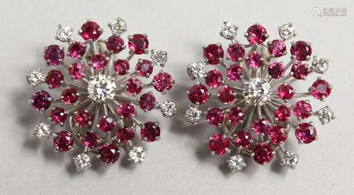 A GOOD PAIR OF 18CT GOLD, DIAMOND AND RUBY STARBURST EARRING...