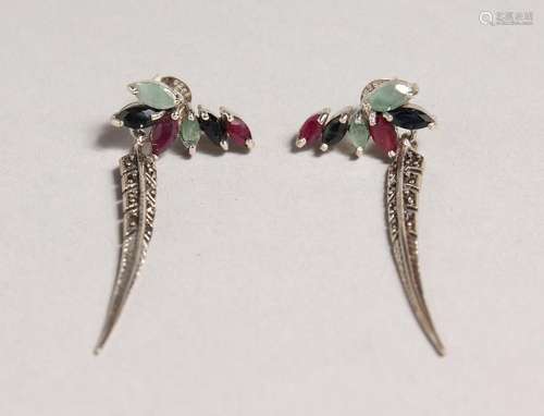 A PAIR OF SILVER, SAPPHIRE, RUBY, AND EMERALD FEATHER EARRIN...